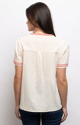 Soft ivory blouse in 100% cotton with coral-red floral embroidery, contrast stitching and a relaxed straight fit – Volange Paris, Parisian fashion in Sydney (Mosman, Paddington and Bronte) or Australia-wide online.