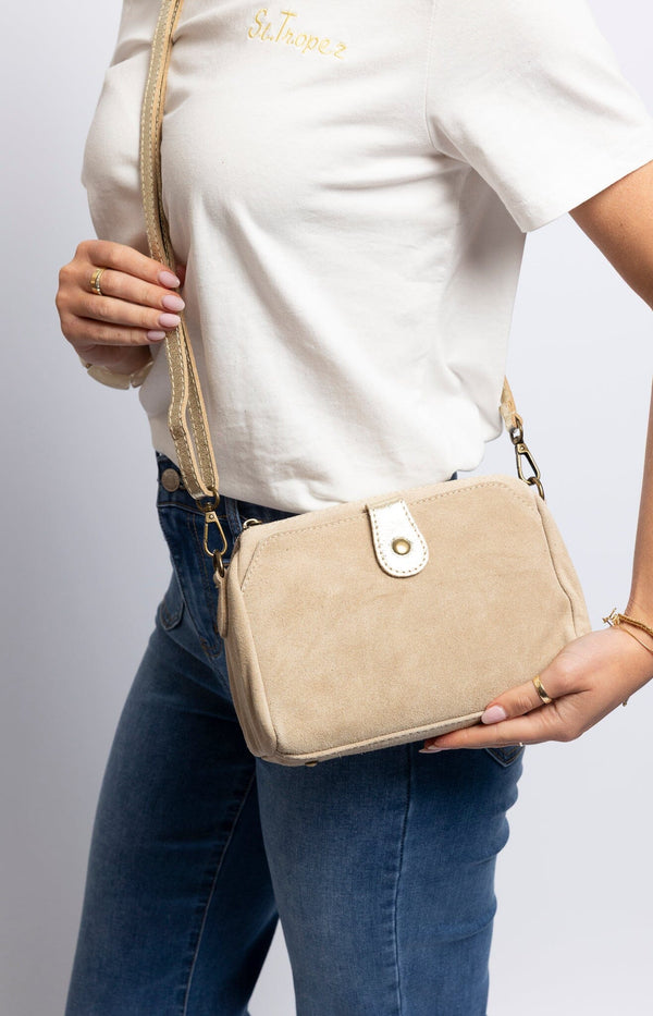 Beige leather crossbody bag with adjustable strap – Elegant French fashion accessory from Volange Paris