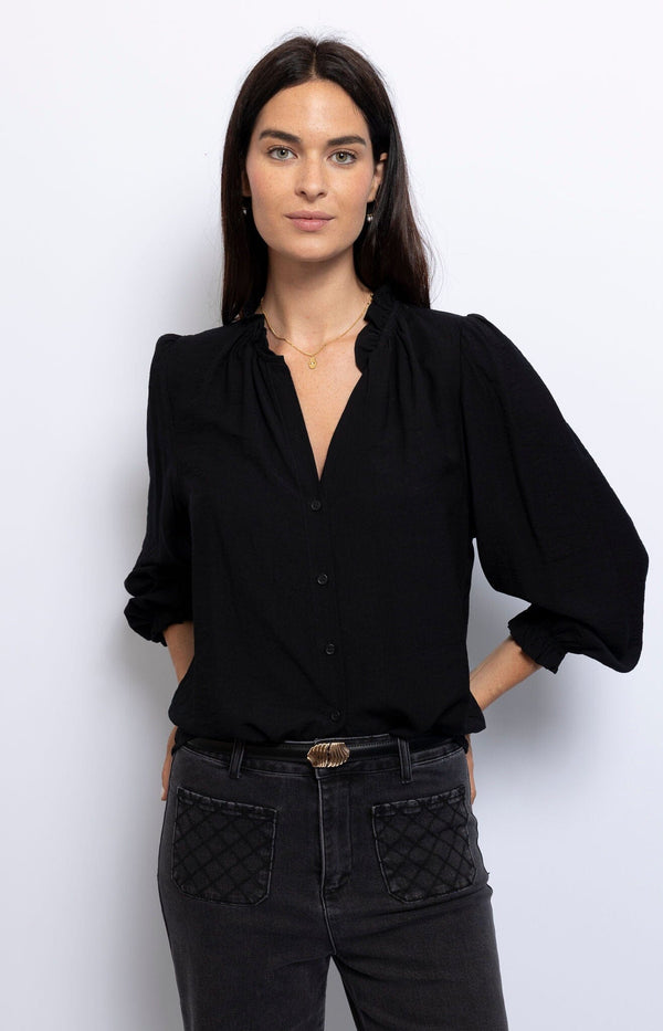 Black Charlotte blouse with a sleek, lightweight design, offering timeless French sophistication – Volange Paris.