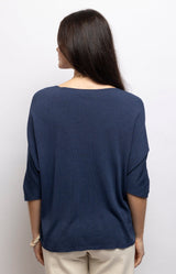 Navy lightweight knit top with a flattering V-neck, batwing sleeves and relaxed draped fit in a soft modal blend – Volange Paris, Parisian fashion in Sydney (Mosman, Paddington and Bronte) or Australia-wide online.