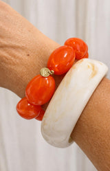 Pink resin bead bracelet with glossy oval beads – Parisian elegance by Volange Paris, French fashion accessories in Sydney (Mosman, Paddington and Bronte) or Australia-wide online.