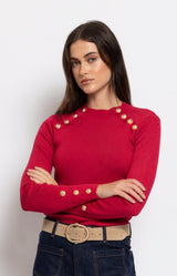 Red knit jumper with gold button shoulder detail – Parisian elegance by Volange Paris, French fashion in Sydney.