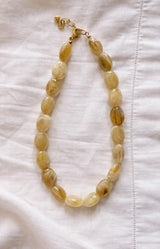 Beige marbled resin bead necklace with gold clasp – Parisian elegance by Volange Paris, French fashion accessories in Sydney (Mosman, Paddington and Bronte) or Australia-wide online.