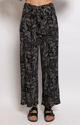 Black wide-leg pants with leaf print and elasticated waist, Parisian summer elegance by Volange Paris
