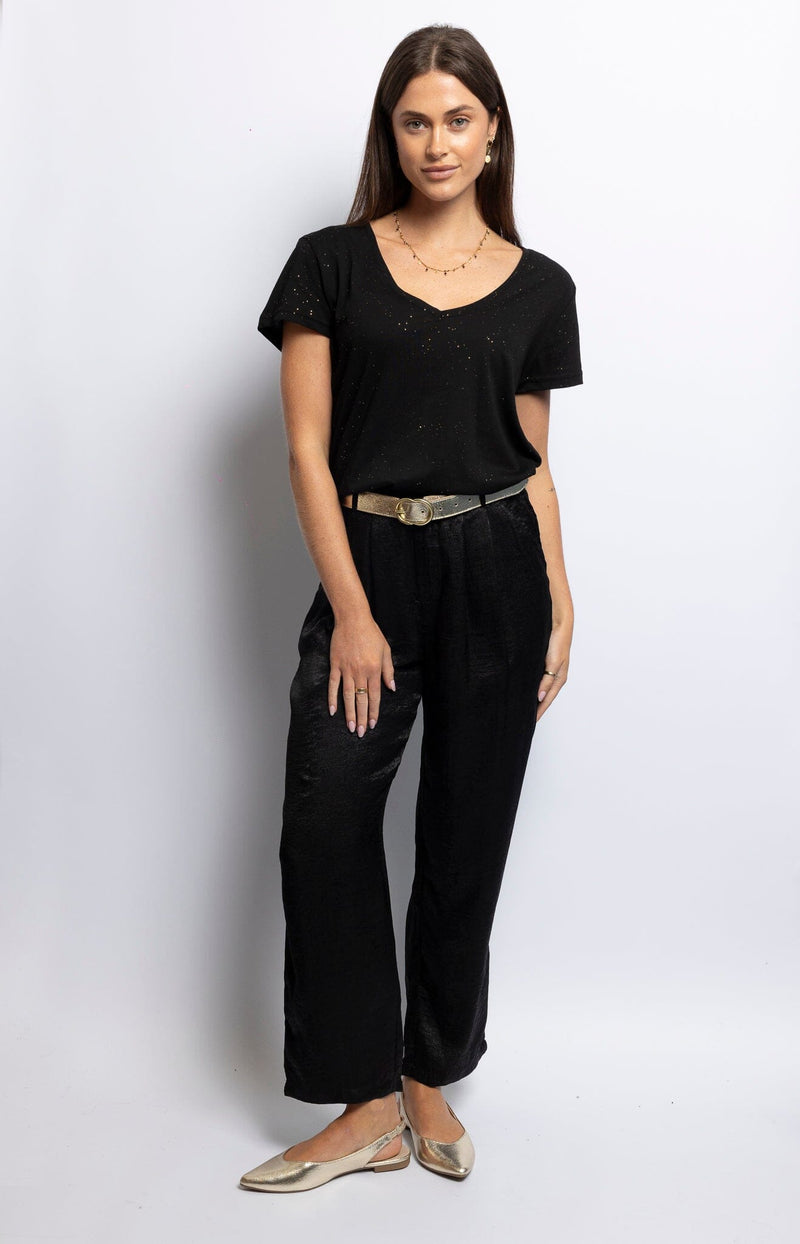 Shimmering black polyester tapered pants with pleated front, elastic waist, and button closure – Luxe Parisian sparkle by Volange Paris