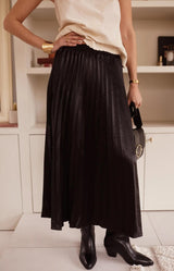 Black pleated midi skirt with soft satin finish and elegant flow, Parisian elegance by Volange Paris, French fashion in Sydney