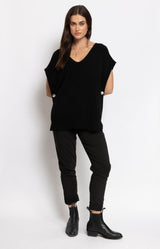 Black relaxed pants with metallic star detail – Parisian elegance by Volange Paris, French fashion in Sydney.