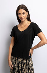 Slim black V-neck T-shirt with subtle gold sparkle print and short sleeves for versatile chic – Timeless Parisian elegance by Volange Paris