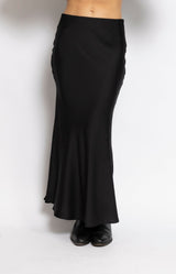 Black satin-look maxi skirt with fluid silhouette by Volange Paris, Parisian elegance by Volange Paris.