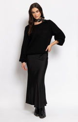 Black satin-look maxi skirt with fluid silhouette by Volange Paris, Parisian elegance by Volange Paris.
