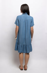 Blue chambray-style lyocell dress with a ruffled collar, relaxed fit, gathered back and flounced hem – Volange Paris, Parisian fashion in Sydney (Mosman, Paddington and Bronte) or Australia-wide online.