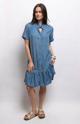 Blue chambray-style lyocell dress with a ruffled collar, relaxed fit, gathered back and flounced hem – Volange Paris, Parisian fashion in Sydney (Mosman, Paddington and Bronte) or Australia-wide online.