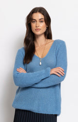 Soft sky blue mohair blend jumper with a flattering V-neckline and lightweight fluffy knit for effortless elegance – Volange Paris, Parisian fashion in Sydney (Mosman, Paddington and Bronte) or Australia-wide online.