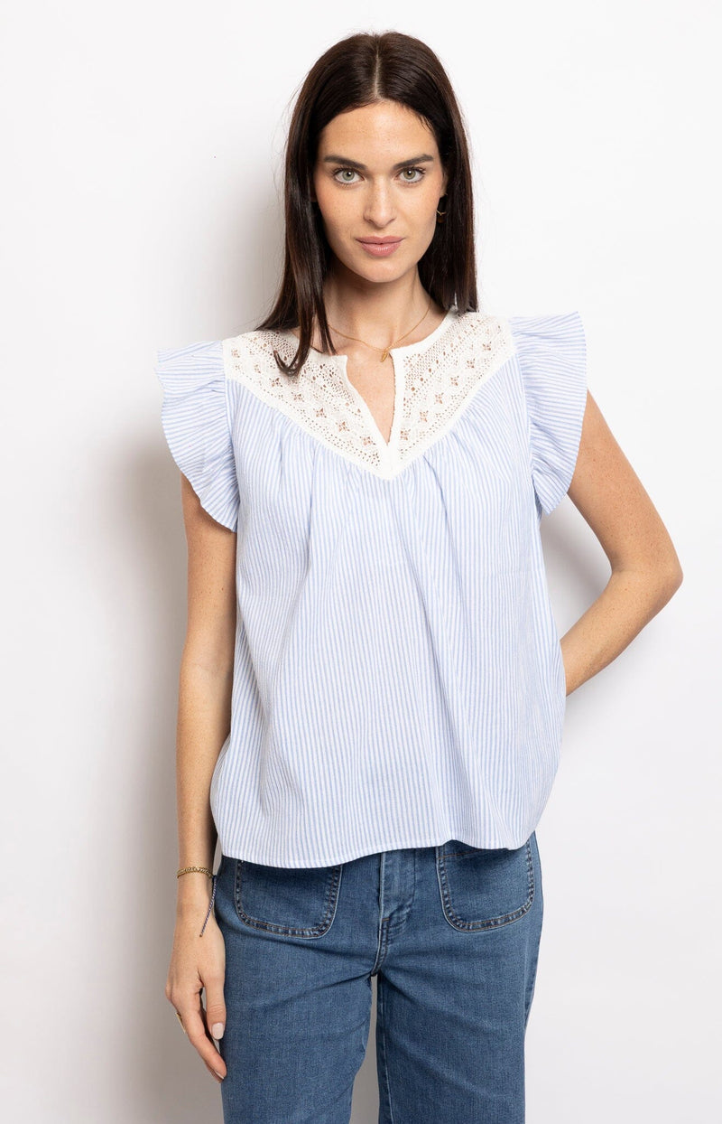 Light blue striped blouse with lace neckline and flutter sleeves – Parisian elegance by Volange Paris.