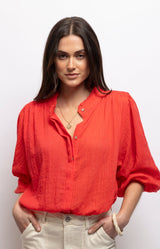 Bright red blouse in lightweight cotton voile with a delicate ruffled collar, shirred cuffs and relaxed fit – Volange Paris, Parisian fashion in Sydney (Mosman, Paddington and Bronte) or Australia-wide online.