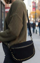 Charlotte suede black bumbag with antique gold-tone studs and adjustable strap – Volange Paris, Parisian fashion in Sydney (Mosman, Paddington and Bronte) or Australia-wide online.
