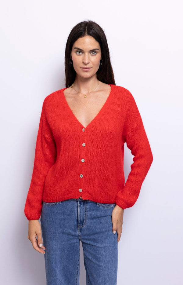 Red Candice cardigan with a relaxed fit and soft texture, offering cozy layering for effortless autumn style – French fashion by Volange Paris.