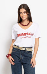 White cotton graphic T-shirt featuring a sparkling Champagne S'il Vous Plaît slogan, relaxed fit and flattering V-neckline for effortless Parisian style – Volange Paris, Parisian fashion in Sydney (Mosman, Paddington and Bronte) or Australia-wide online.