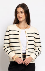 Cream and black striped knit cardigan with gold-tone buttons and a timeless Breton-inspired design for effortless Parisian style – Volange Paris, Parisian fashion in Sydney (Mosman, Paddington and Bronte) or Australia-wide online.