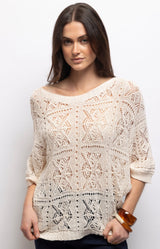 Cream crochet top with intricate openwork detailing, a relaxed fit and three-quarter sleeves – Volange Paris, Parisian fashion in Sydney (Mosman, Paddington and Bronte) or Australia-wide online.