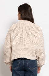 Cream cropped chunky knit cardigan with a relaxed silhouette, patch pockets and cosy texture for effortless layering – Volange Paris, Parisian fashion in Sydney (Mosman, Paddington and Bronte) or Australia-wide online.