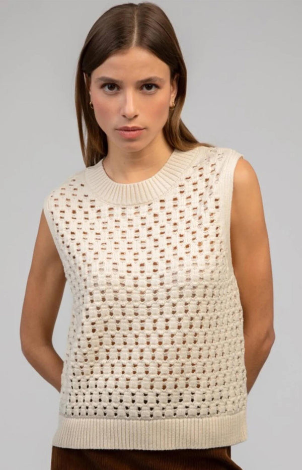 Cream sleeveless mesh knit top with ribbed neckline and relaxed fit – French fashion by Volange Paris.