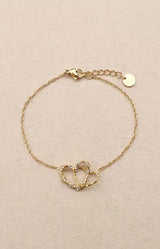 Double heart gold bracelet with delicate crystal details and fine chain – elegant French jewellery by Volange Paris, available in Sydney (Mosman, Paddington and Bronte) or Australia-wide online.