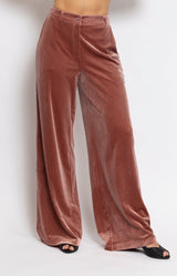 Dusty rose velvet wide leg pants with a flattering high-rise fit, flowing silhouette and soft stretch finish for effortless day-to-night styling – Volange Paris, Parisian fashion in Sydney (Mosman, Paddington and Bronte) or Australia-wide online.