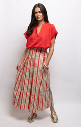 Ankle-length cotton skirt with a vintage-inspired floral stripe print in red, pink and cream, front pleats and an elasticated back waistband – Volange Paris, Parisian fashion in Sydney (Mosman, Paddington and Bronte) or Australia-wide online.