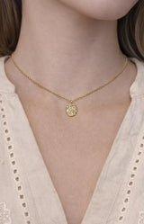 Gold necklace with engraved celestial medallion pendant, Parisian elegance by Volange Paris, French fashion in Sydney