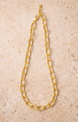 Gold chunky chain necklace with textured oval links, Parisian elegance by Volange Paris, French fashion in Sydney