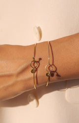 Gold bangle with hook clasp and charm – French jewellery by Volange Paris.