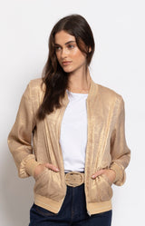 Gold metallic bomber jacket with a subtle shimmer, relaxed fit and zip-front design for effortless day-to-evening style – Volange Paris, Parisian fashion in Sydney (Mosman, Paddington and Bronte) or Australia-wide online.