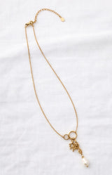 Gold necklace with pearl, seahorse and coral charms – Volange Paris, Parisian fashion in Sydney (Mosman, Paddington and Bronte) or Australia-wide online.