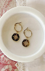 Gold-plated hoop earrings with hammered medallion and star motif – Elegant French jewellery design from Volange Paris