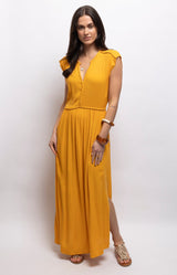 Golden yellow maxi dress in soft textured viscose, featuring a V-neckline, cap sleeves, braided trims, tie belt and side splits – Volange Paris, Parisian fashion in Sydney (Mosman, Paddington and Bronte) or Australia-wide online.