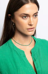 Elegant green adjustable stainless steel necklace with gold plating – Luxurious French jewellery from Volange Paris.