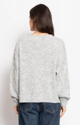 Soft light grey cardigan in a cosy fluffy knit with a relaxed silhouette and delicate button-front detail – Volange Paris, Parisian fashion in Sydney (Mosman, Paddington and Bronte) or Australia-wide online.