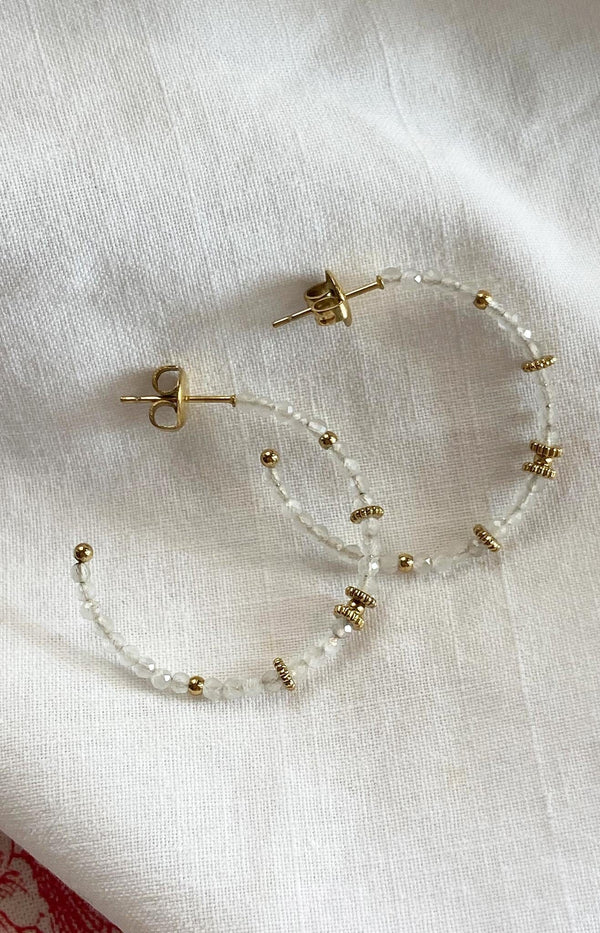 Elegant beaded hoop earrings with transparent crystals and gold accents – French jewellery design from Volange Paris