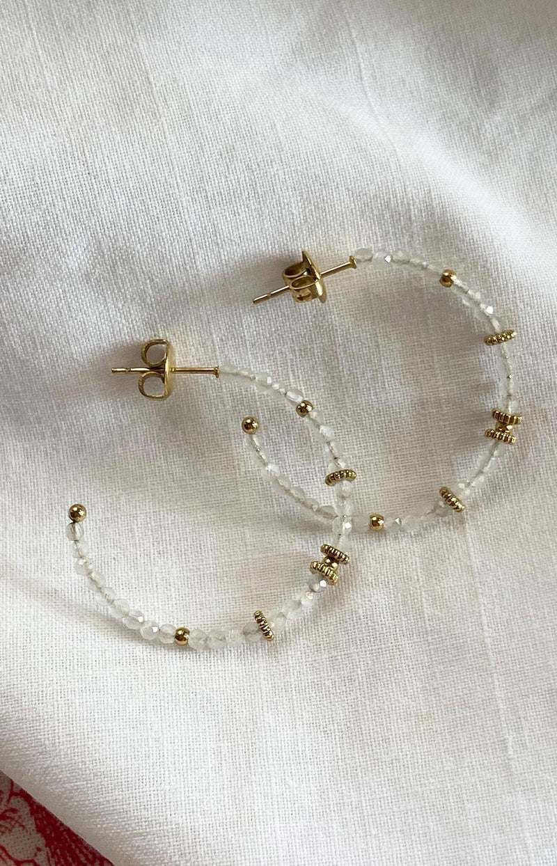 Elegant beaded hoop earrings with transparent crystals and gold accents – French jewellery design from Volange Paris