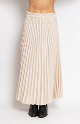 Flowing ivory pleated midi skirt with elegant movement – Volange Paris, Parisian fashion in Sydney (Mosman, Paddington and Bronte) or Australia-wide online.