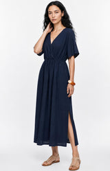 Effortlessly chic navy dress in 100% cotton with a flattering V-neck, elasticated waist and flowing silhouette. Discover Volange Paris, Parisian fashion in Sydney (Mosman, Paddington and Bronte) or Australia-wide online.