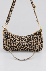 Leopard suede leather shoulder bag with a slim curved shape and adjustable straps for shoulder or crossbody wear – Volange Paris, Parisian fashion in Sydney (Mosman, Paddington and Bronte) or Australia-wide online.
