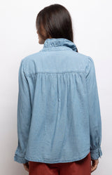 Light blue chambray cotton blouse with a ruffled collar, relaxed fit and gathered back detail – Volange Paris, Parisian fashion in Sydney (Mosman, Paddington and Bronte) or Australia-wide online.