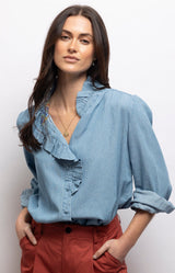 Light blue chambray cotton blouse with a ruffled collar, relaxed fit and gathered back detail – Volange Paris, Parisian fashion in Sydney (Mosman, Paddington and Bronte) or Australia-wide online.