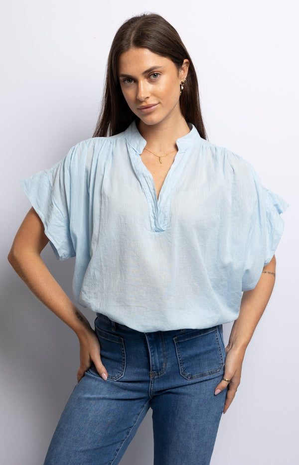 Light blue cotton voile blouse with cap sleeves and relaxed fit – Effortless French fashion by Volange Paris