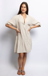 Lightweight 100% linen V-neck dress with roll-up sleeves and a relaxed one-size fit, perfect for warm weather — effortless Parisian style by Volange Paris.