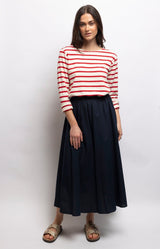 Navy cotton poplin midi skirt with a softly gathered elasticated waist and relaxed A-line silhouette for effortless everyday style – Volange Paris, Parisian fashion in Sydney (Mosman, Paddington and Bronte) or Australia-wide online.
