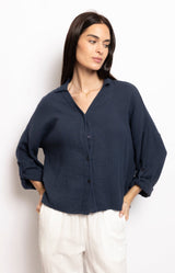 Navy double-gauze cotton relaxed shirt with open collar and rolled 3/4 sleeves – wardrobe essential French fashion by Volange Paris. 
