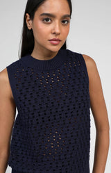 Navysleeveless mesh knit top with ribbed neckline and relaxed fit – French fashion by Volange Paris.